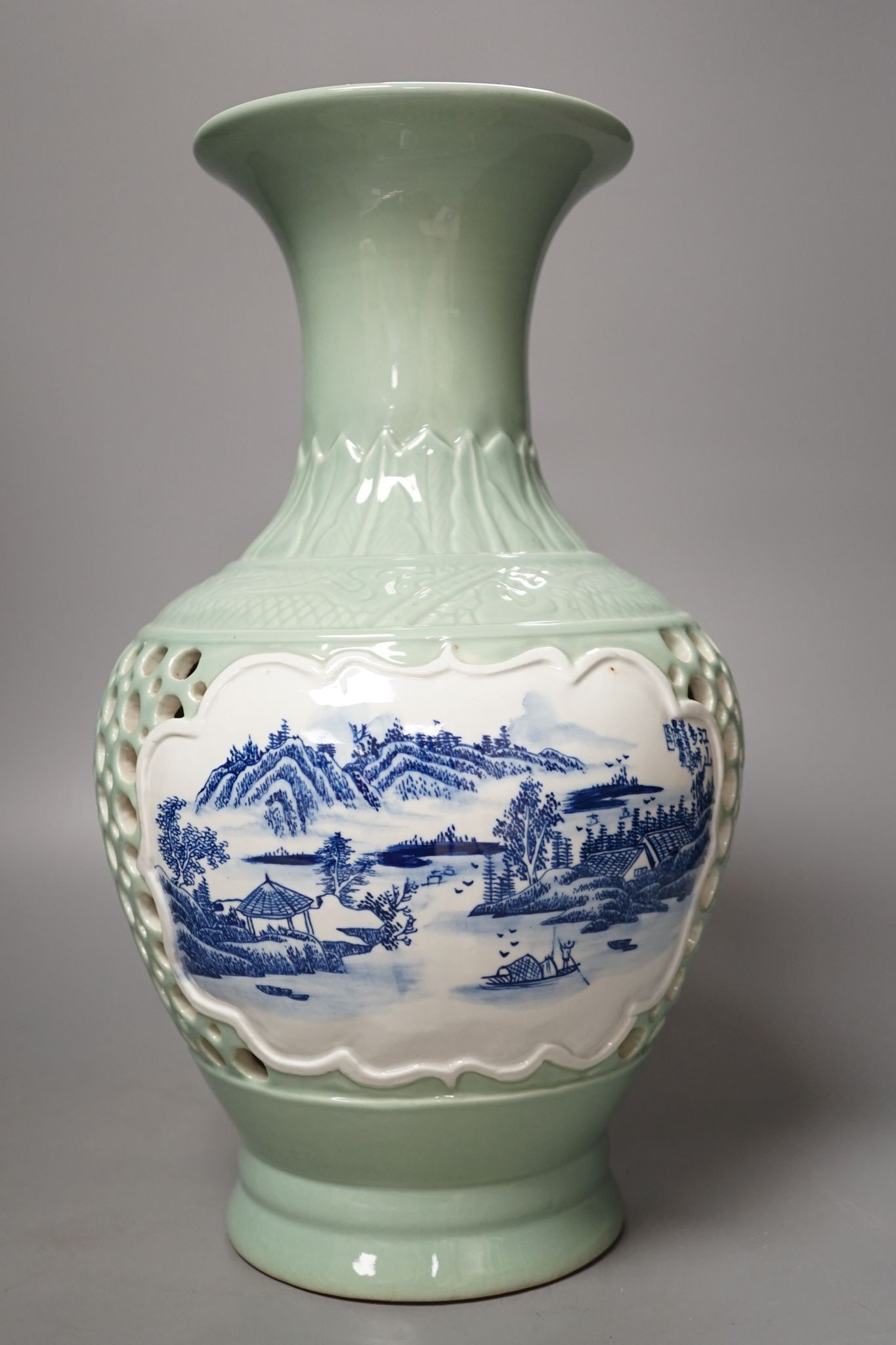 A Chinese double walled celadon ground vase, 37.5 cm high